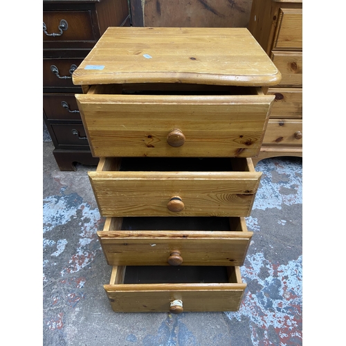 65 - A modern pine bedside chest of drawers - approx. 68cm high x 43cm wide x 38cm deep