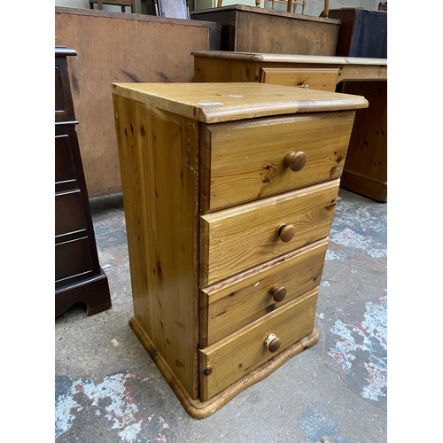 65 - A modern pine bedside chest of drawers - approx. 68cm high x 43cm wide x 38cm deep