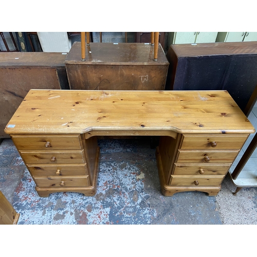 66 - A modern pine dressing table - approx. 76cm high x 146cm wide x 44cm deep