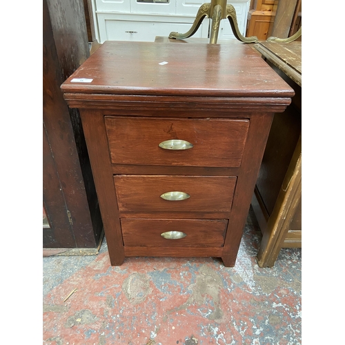 73 - A modern stained hardwood bedside chest of drawers - approx. 61cm high x 45cm wide x 40cm deep