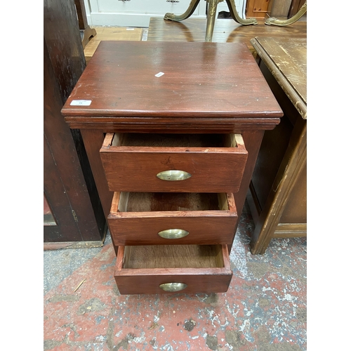 73 - A modern stained hardwood bedside chest of drawers - approx. 61cm high x 45cm wide x 40cm deep