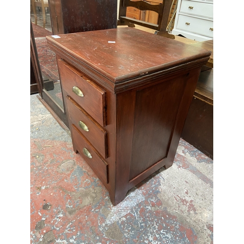 73 - A modern stained hardwood bedside chest of drawers - approx. 61cm high x 45cm wide x 40cm deep