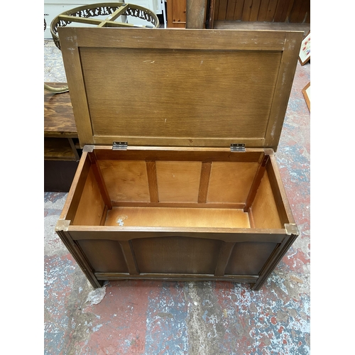 74 - An oak blanket box - approx. 61cm high x 90cm wide x 48cm deep