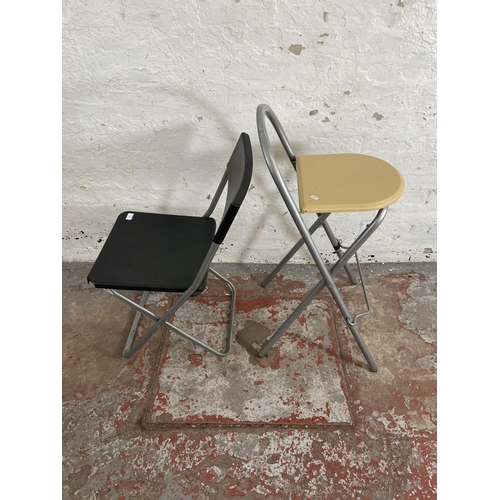 77 - Two modern folding chairs