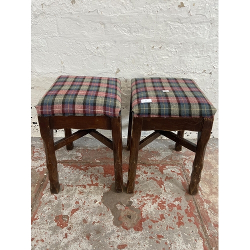 81 - A pair of stained beech and tartan fabric upholstered stools - approx. 47cm high x 31cm wide x 31cm ... 