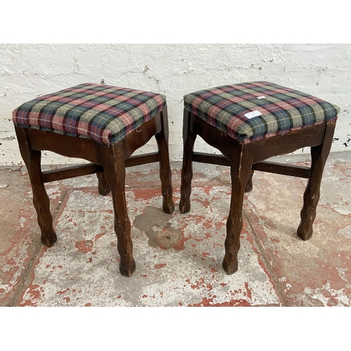 81 - A pair of stained beech and tartan fabric upholstered stools - approx. 47cm high x 31cm wide x 31cm ... 