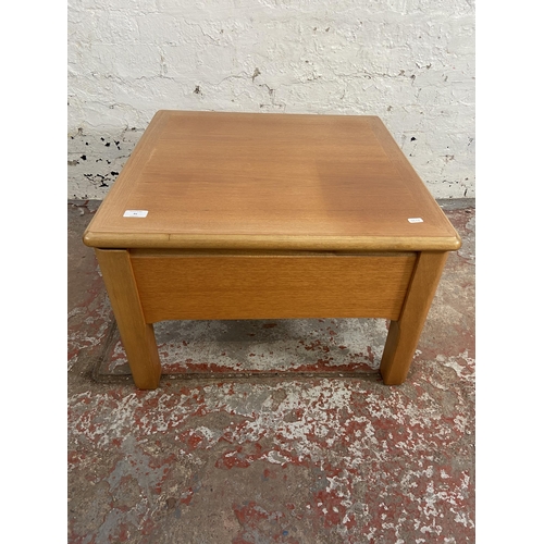 91 - A Nathan teak metamorphic coffee table - approx. 41cm high x 63cm wide x 63cm deep