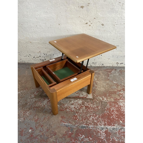 91 - A Nathan teak metamorphic coffee table - approx. 41cm high x 63cm wide x 63cm deep