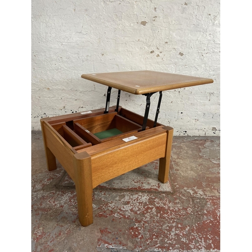 91 - A Nathan teak metamorphic coffee table - approx. 41cm high x 63cm wide x 63cm deep