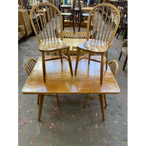 92 - A mid 20th century bespoke oak and beech dining table and four Ercol style elm and beech dining chai... 