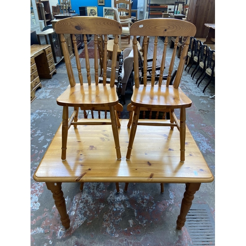 96 - A modern pine rectangular dining table and four chairs - approx. 77cm high x 75cm wide x 121cm long