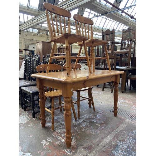 96 - A modern pine rectangular dining table and four chairs - approx. 77cm high x 75cm wide x 121cm long