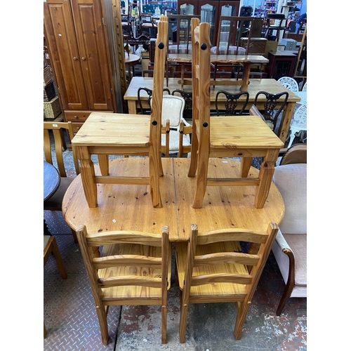 99 - A modern pine extending dining table and six chairs - approx. 74cm high x 92cm wide x 146cm long