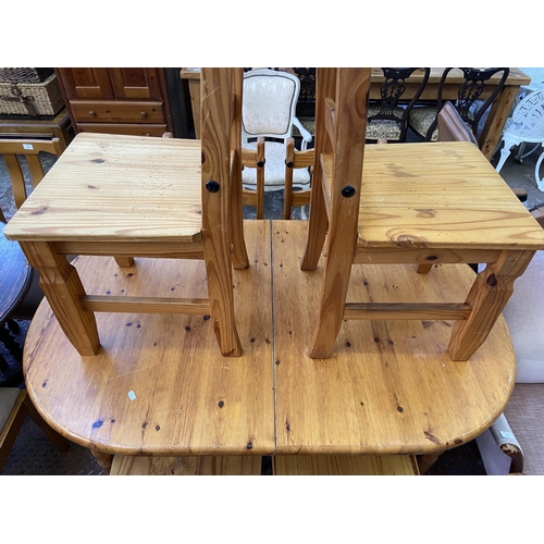 99 - A modern pine extending dining table and six chairs - approx. 74cm high x 92cm wide x 146cm long