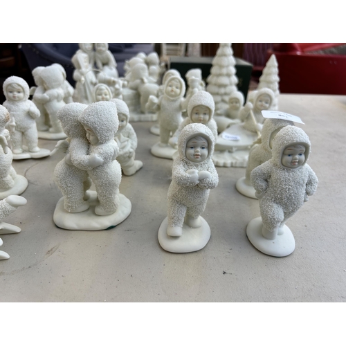 353 - A collection of Department 56 Snowbabies figurines