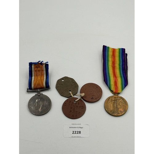 2228 - Five WWI South African items, one medal pair and dog tag presented to Pte. A.H.D. Taylor 9th S.A.H. ... 