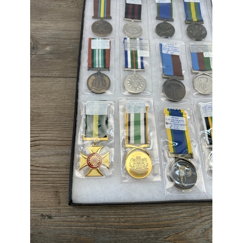 2309 - A collection of South African military medals to include Homeland Army Soldiers, Homeland Gallantry ... 