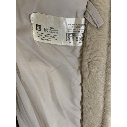 413 - A vintage ivory faux fur full length jacket