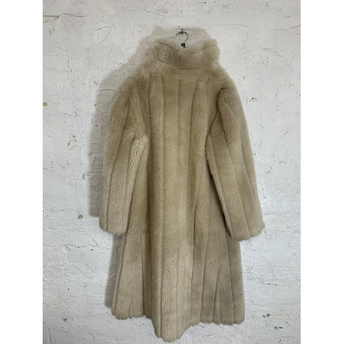 413 - A vintage ivory faux fur full length jacket