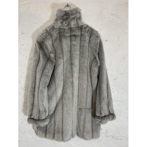 415 - A Dennis Basso faux fur jacket