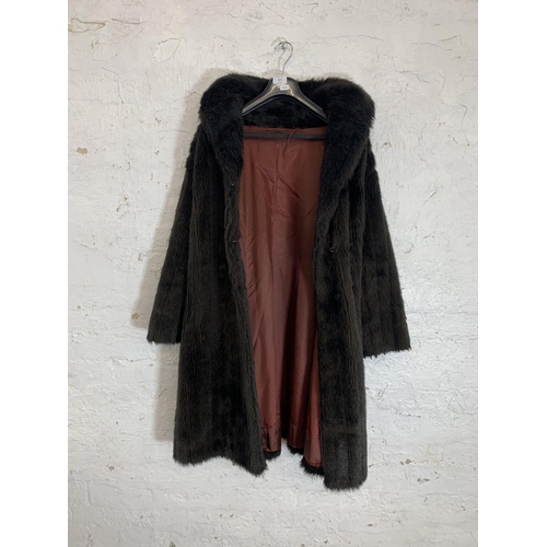 416 - A vintage silk lined fur jacket