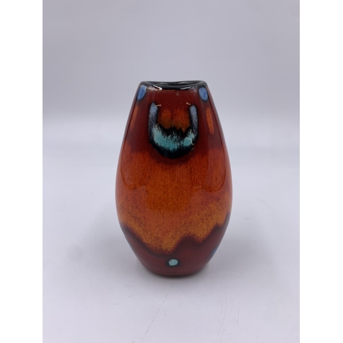 300 - A Poole Pottery Living Glaze Collection Volcano pattern bud vase - approx. 11cm high