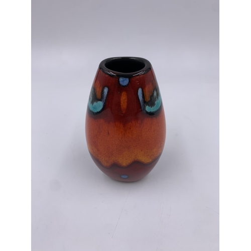 300 - A Poole Pottery Living Glaze Collection Volcano pattern bud vase - approx. 11cm high