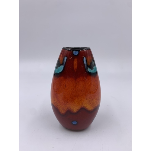 300 - A Poole Pottery Living Glaze Collection Volcano pattern bud vase - approx. 11cm high