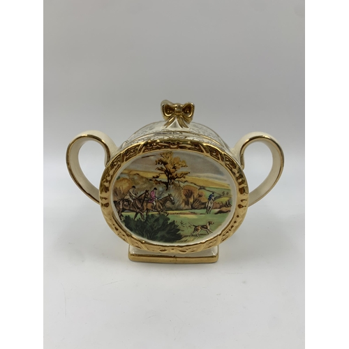 311 - A Sadler No. 1763 barrel shaped hunting scene three piece tea set