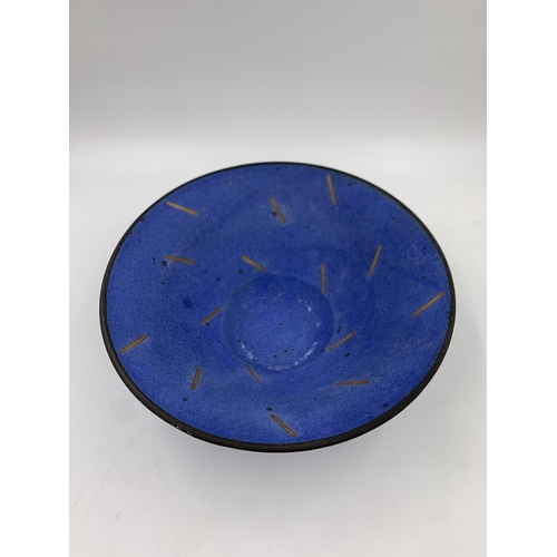 323 - A blue glazed studio pottery circular bowl stamped 