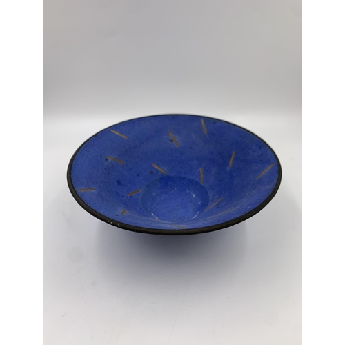 323 - A blue glazed studio pottery circular bowl stamped 