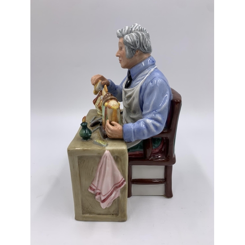 325 - A Royal Doulton The China Repairer figurine - HN2943