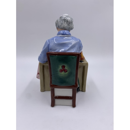 325 - A Royal Doulton The China Repairer figurine - HN2943