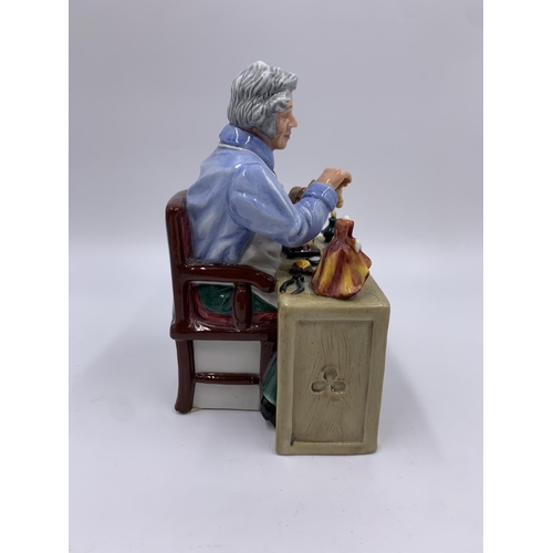 325 - A Royal Doulton The China Repairer figurine - HN2943