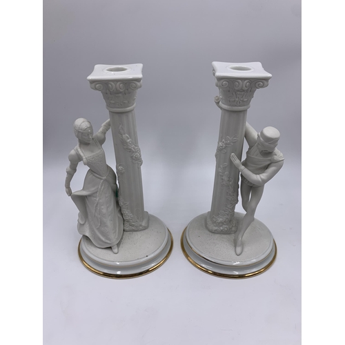 328 - A pair of 1986 The Franklin Mint The Romeo and Juliet fine porcelain candlesticks - approx. 25cm hig... 