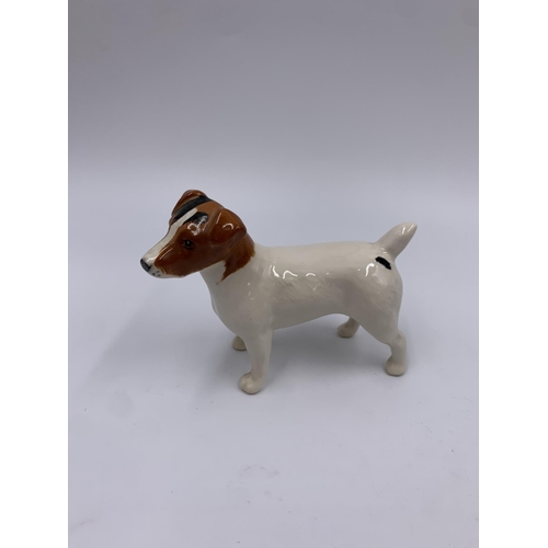 329 - Three Beswick figurines, CH. Claybury Leegwater, CH. Dunsley Coy Boy and Jack Russell