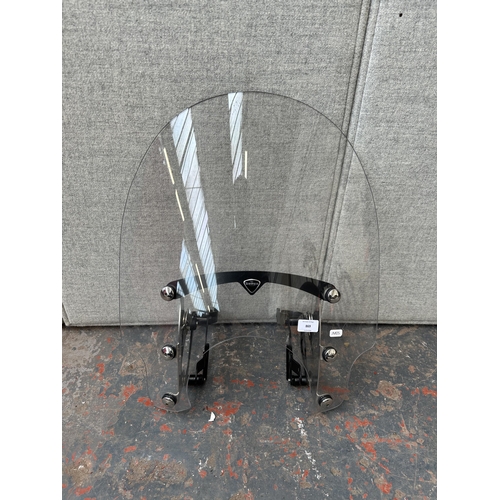 869 - A Triumph perspex motorbike windshield