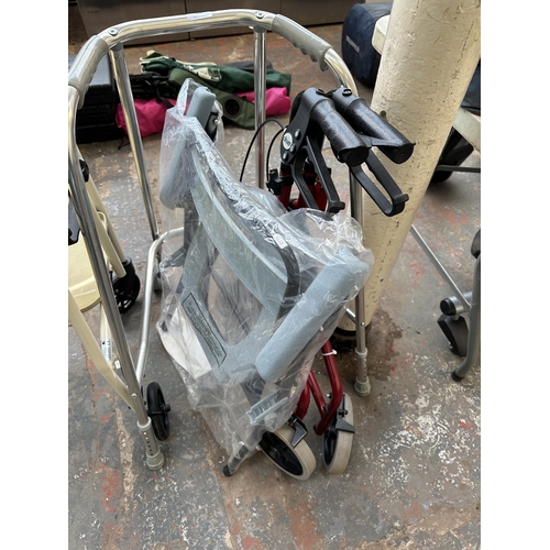 872 - Four pieces of mobility equipment to include toilet and three various walking frames