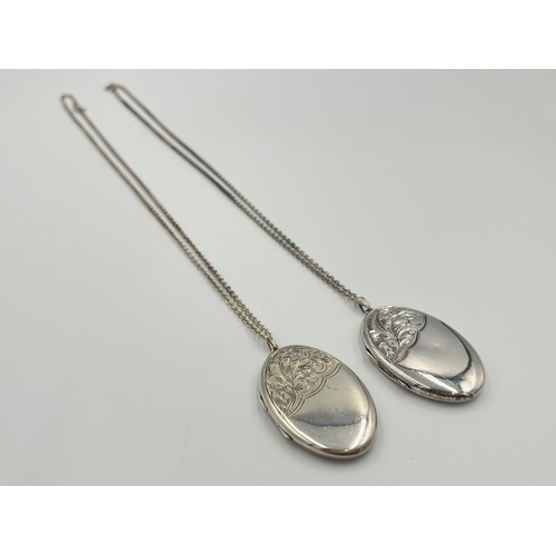 2037 - Two hallmarked Birmingham silver photo lockets on white metal chain necklaces - approx. gross weight... 