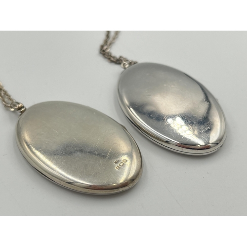 2037 - Two hallmarked Birmingham silver photo lockets on white metal chain necklaces - approx. gross weight... 