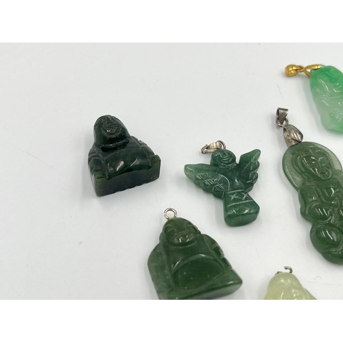 2039 - Ten jade buddha pendants with 9ct gold, silver and 18k gold plated clasps