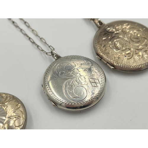 2042 - Three hallmarked sterling silver locket pendant necklaces, two Birmingham and one Sheffield - approx... 