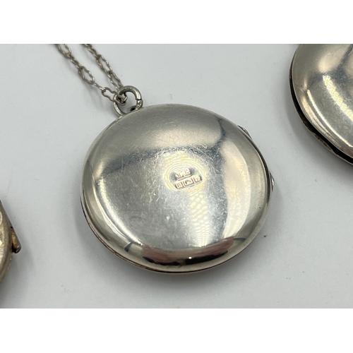 2042 - Three hallmarked sterling silver locket pendant necklaces, two Birmingham and one Sheffield - approx... 