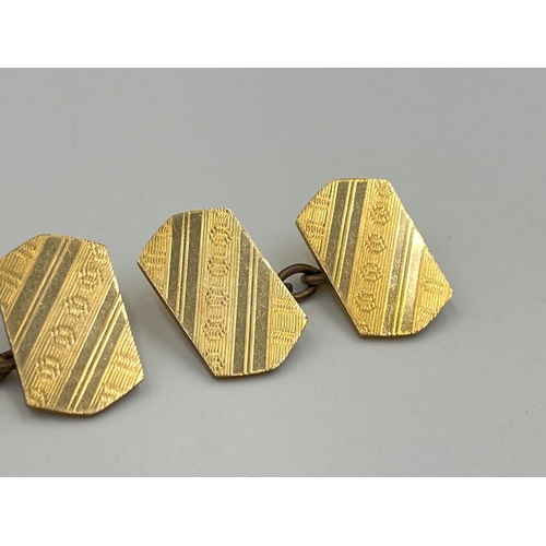 2047 - A boxed pair of Henry Griffith & Sons Ltd. 12ct gold front and back cufflinks