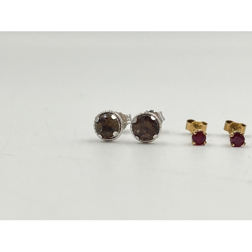 2049 - Three pairs of 9ct gold gemstone set stud earrings, one ruby, one smoky quartz and one sapphire - ap... 