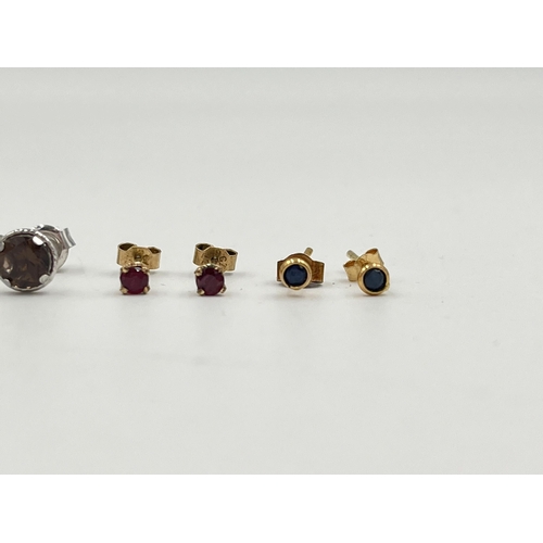 2049 - Three pairs of 9ct gold gemstone set stud earrings, one ruby, one smoky quartz and one sapphire - ap... 