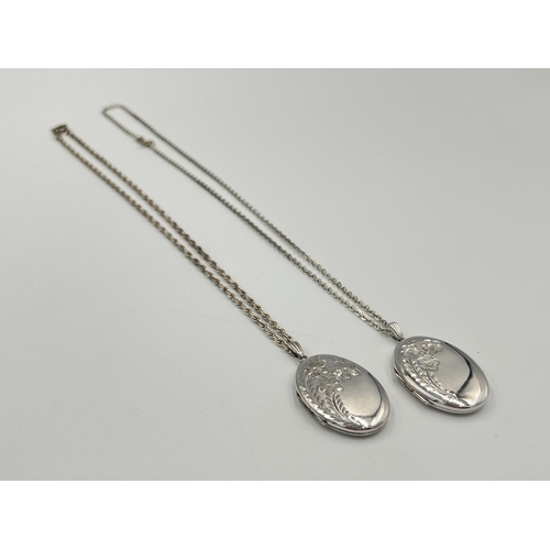 2050 - Two hallmarked Birmingham silver locket pendant necklaces - approx. gross weight 21.81g