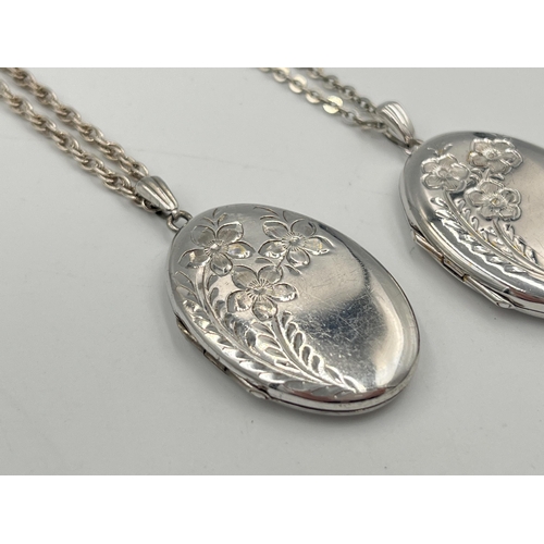 2050 - Two hallmarked Birmingham silver locket pendant necklaces - approx. gross weight 21.81g