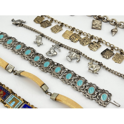 2061 - A collection of bracelets to include white metal, bone, enamel etc.