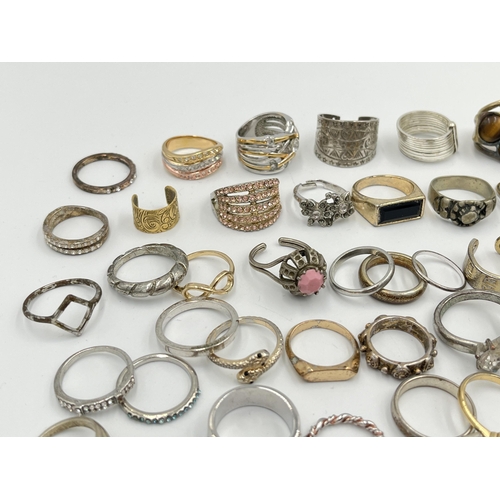 2062 - A collection of dress rings to include white metal, silver plated etc.